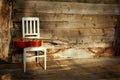 Blues guitar on a white chair with a wooden backgr