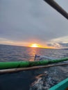 Bluesea sunset inside green boat Royalty Free Stock Photo