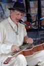 Bluesman Watermelon Slim plays slide guitar