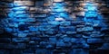 Bluestone Wall Illuminated By Dramatic Spotlights, Creating Moody Ambiance At Night. Royalty Free Stock Photo