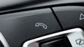 Bluetooth buttons located on the steering wheel of a car to talk over the phone hands free. Button car cell phone. Royalty Free Stock Photo