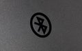 Bluetooth symbol on the plastic surface.