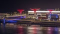 Bluewaters Island in Dubai aerial night timelapse with illuminated buildings. Royalty Free Stock Photo