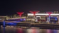 Bluewaters Island in Dubai aerial night timelapse with illuminated buildings. Royalty Free Stock Photo