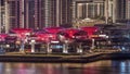 Bluewaters Island in Dubai aerial night timelapse with illuminated buildings. Royalty Free Stock Photo