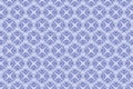 Embroidered monochrome patterns of blue flowers and leaves on bluish background