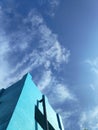 Bluish water tower under the bright blue sky