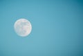 This bluish white full moon in Daylight with Copy Space Royalty Free Stock Photo