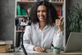 Blur background of african american woman in white shirt recording new video blog Royalty Free Stock Photo