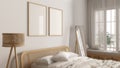Blur background, frame mockup, cozy wooden bedroom close up, rattan furniture, double bed with duvet and pillows, mirror, window Royalty Free Stock Photo