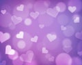 Blur background with love theme - hearts and light orbs - purple