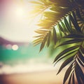 Blur beautiful nature green palm leaf on tropical beach with bokeh sun light flare wave abstract background Royalty Free Stock Photo