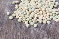 Blur blurred dry sugar pea seed, green nuts on the wood, for ba