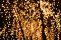 Blur - bokeh Decorative outdoor string lights hanging on tree in the garden at night time Royalty Free Stock Photo