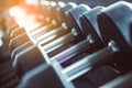 Blur Equipment And Machines At The Empty Modern Gym Room. Fitness Center. Toned image.