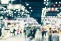 Blur Event Hall In Large Exhibition Center With People Walking Background People