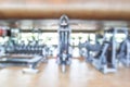 Blur gym background fitness center or health club with blurry sports exercise equipment for aerobic workout and bodybuilding Royalty Free Stock Photo