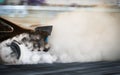 Blur image of car drifting on race track Royalty Free Stock Photo