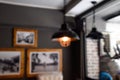 Blur image - Defocus or out of focus black lamp on the ceiling, sitting corner in the restaurant during the daytime - Blurred Royalty Free Stock Photo