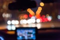 Blur image from inside car with bokeh lights from traffic jam on night Royalty Free Stock Photo