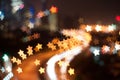 Blur image of Kuala Lumpur city, star bokeh shape