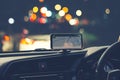 Blur image of people driving car on night time