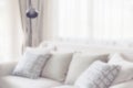 Blur image of pillows on sofa in living room Royalty Free Stock Photo