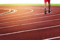 Blur leg running man in stadium track line in sport stadium background Royalty Free Stock Photo