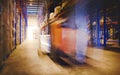 Blur Motion of Workers Driving Forklift Unloading Cargo Pallets in The Warehouse. Shipping Warehouse. Delivery Service Shipment Royalty Free Stock Photo