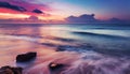 Blur of ocean waves with colorful sunset landscape with reflection on water Royalty Free Stock Photo
