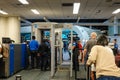 The blur of people going through Orlando International Airport MCO TSA security on a busy day