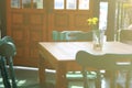 Blur picture of table and chairs in restaurant