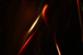 Blur red orange lines defocused fire rays dark