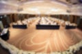 Blur of seminar room in convention hall ready to set up for meeting or conferenc