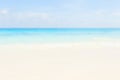 Blur summer white sand beach with sparkling sea water Royalty Free Stock Photo