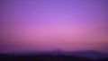 Blur Sunset twilight gradient purple pink night sky with mountain
