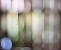 Blured bokeh lights in a row. Abstract defocused background Royalty Free Stock Photo