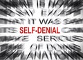 Blured text with focus on SELF DENIAL Royalty Free Stock Photo
