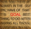 Blured text on vintage paper with focus on GOAL Royalty Free Stock Photo