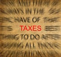 Blured text on vintage paper with focus on TAXES