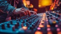 Blurreacd image of a sound engineer adjusting audio levels on a mixing console