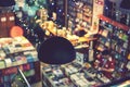 Blurred abstract background of book on bookstore. blurry bookshelf in library room for your background. toned Royalty Free Stock Photo