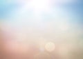 Blurred abstract background of colorful sunny sandy beach with sun flare Royalty Free Stock Photo