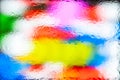 Blurred abstract background. Abstract image of colored spots through the wet glass. Drops of water Royalty Free Stock Photo