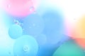 Blurred abstract background. Image of pink, blue, gray and yellow circles of different sizes. Royalty Free Stock Photo