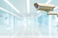 Closed Circuit Television Camera or Security CCTV camera with blurry image of walking way inside shopping mall. Royalty Free Stock Photo