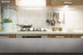 Blurred abstract background. Modern kitchen with tabletop and space for display your products Royalty Free Stock Photo