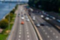 Blurred abstract background of traffic cars on the multi lane highway during rush hour