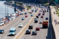 Blurred abstract background of traffic cars on the multi lane highway during rush hour