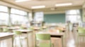 Blurred abstract classroom interior with desks and chalkboard Royalty Free Stock Photo